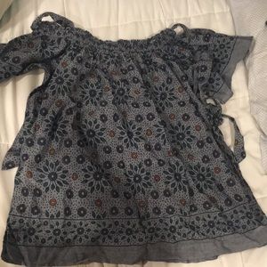 Shoulder less flowered shirt